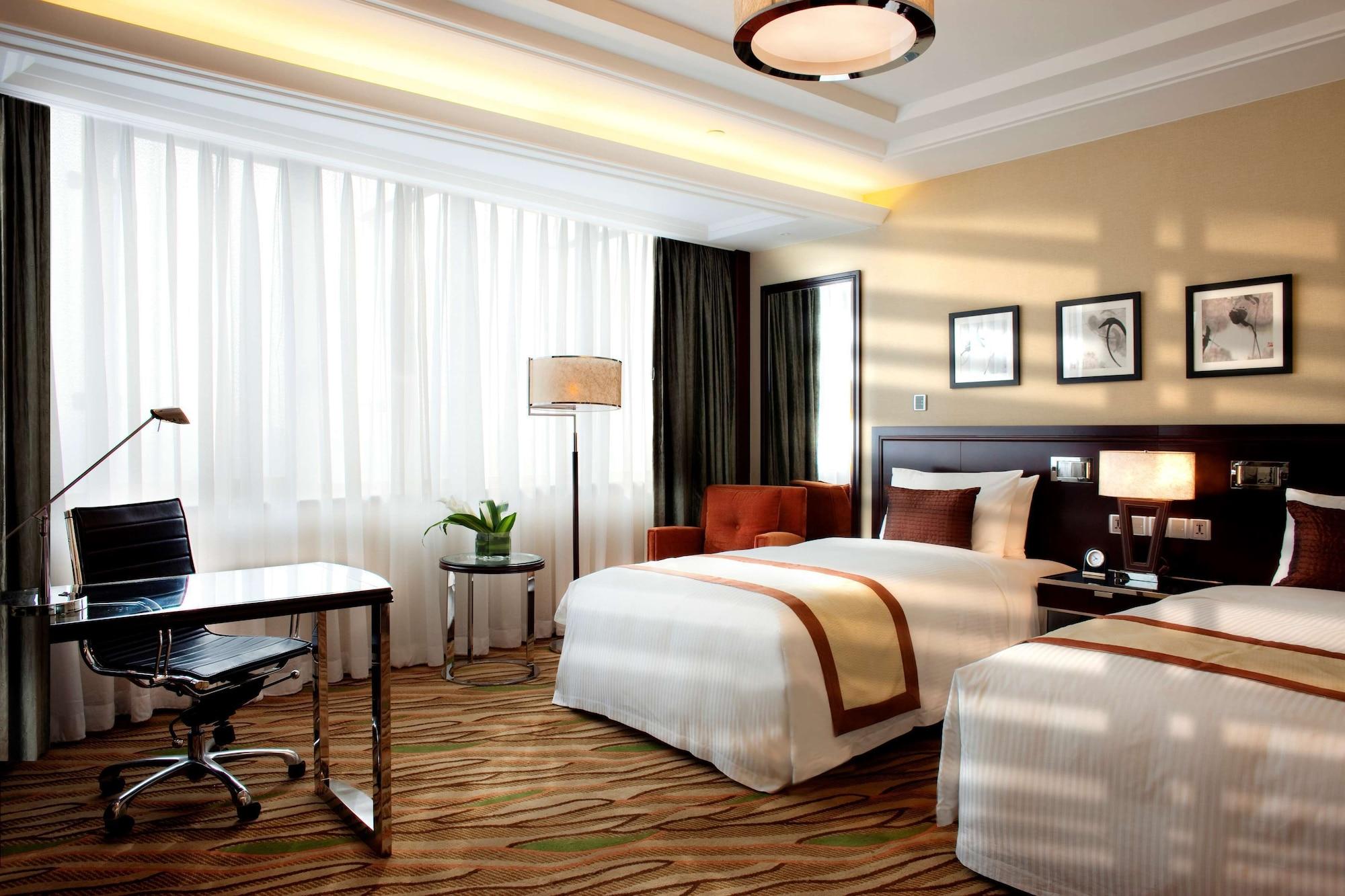 מלון Radisson טיאנג'ין מראה חיצוני תמונה